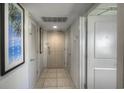 Hallway with tiled floor and simple decor at 107 S Ocean Blvd. # 701, Myrtle Beach, SC 29577