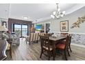 Elegant dining area with hardwood floors and ocean views at 2600 North Ocean Blvd. # 211, Myrtle Beach, SC 29577