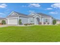 Charming house with a spacious lawn and attached garage at 360 Hillsborough Dr., Conway, SC 29526
