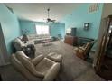 Spacious living room with light carpet and vaulted ceilings at 501 Sarah Dr., Conway, SC 29526