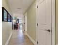 Hallway with tile flooring, leading to a living area at 8121 Amalfi Pl. # 5-103, Myrtle Beach, SC 29572