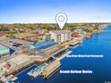 Aerial view of waterfront condo near restaurants and marina at 4445 Kingsport Rd. # 303, Little River, SC 29566