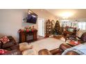 Cozy living room decorated for the holidays, featuring a fireplace and comfortable seating at 1121 Rookery Dr., Myrtle Beach, SC 29588
