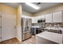Modern kitchen with stainless steel appliances at 1286 River Oaks Dr. # 8-M, Myrtle Beach, SC 29579