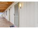 View of an outdoor hallway with unit entry doors and exterior lighting at 4406 N Ocean Blvd. # C1, North Myrtle Beach, SC 29582