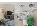 Bright and airy living room with vaulted ceilings, a ceiling fan, and comfortable seating at 4577 Fringetree Dr., Murrells Inlet, SC 29576