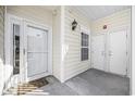 Front door with covered entryway and double storage closet at 4924 Pond Shoals Ct. # 101, Myrtle Beach, SC 29579