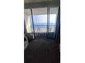 Balcony with ocean view, table, and chairs at 1105 S Ocean Blvd. # 830, Myrtle Beach, SC 29577