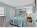 Bedroom with a light teal theme and ocean decor at 201 S Ocean Blvd. # 1602, North Myrtle Beach, SC 29582