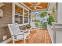 Inviting front porch with rocking chairs and a view of the neighborhood at 317 Goddard Ln., Murrells Inlet, SC 29576