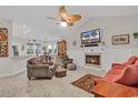 Spacious living area with fireplace, high ceilings, and ample natural light at 317 Goddard Ln., Murrells Inlet, SC 29576