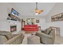 Cozy living room featuring a fireplace and comfortable seating at 317 Goddard Ln., Murrells Inlet, SC 29576
