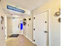 Bright condo entryway with tiled floors and access to multiple rooms at 4800 S Ocean Blvd. # 611, North Myrtle Beach, SC 29582