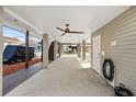 Covered patio area with concrete flooring and storage at 6001 - 5326 S Kings Hwy., Myrtle Beach, SC 29575