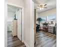 Home office with built-in shelving and plenty of natural light at 4551 Day Lily Run St., Myrtle Beach, SC 29579