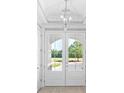 Bright entryway with double doors and a view of the backyard at 1017 Muscovy Pl., Conway, SC 29526