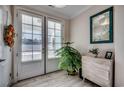 Bright and airy entryway with tiled floors and a large mirror at 1509 Seabrook Plantation Way, North Myrtle Beach, SC 29582