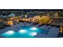 Night view of community amenities including pool and clubhouse at 5048 Cambria Ct., Little River, SC 29566