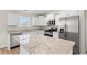 Modern kitchen with stainless steel appliances and granite countertops at 637 Woodside Dr., Conway, SC 29526