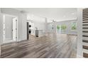 Open concept living and kitchen area with wood-look floors at Tbd Mud Minnow Dr., Pawleys Island, SC 29585