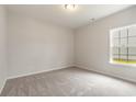 Simple bedroom with neutral walls and carpet at 1308 Crooked Hook Rd., North Myrtle Beach, SC 29582