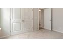 Spacious bedroom with double doors and carpet at 1308 Crooked Hook Rd., North Myrtle Beach, SC 29582
