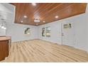 Light filled living room with wood accent ceiling and vinyl plank flooring at 447 Bragdon Ave., Georgetown, SC 29440