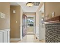 Bright entryway with tiled floor and view of backyard at 4809 Pine Lake Dr., Myrtle Beach, SC 29577