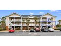 Three-story building, unit 324 highlighted at 5801 Oyster Catcher Dr. # 324, North Myrtle Beach, SC 29582