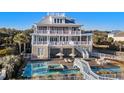 Luxury oceanfront home with a private pool, spa, and large deck at 8702 N Ocean Blvd., Myrtle Beach, SC 29572