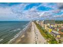 Expansive aerial view of beach and coastline at 201 77Th Ave. N # 923, Myrtle Beach, SC 29572