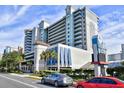 Compass Cove resort building, multiple stories with parking and landscaping at 2301 S Ocean Blvd. # Ph22, Myrtle Beach, SC 29577