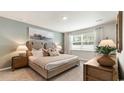 Spacious main bedroom with neutral decor and large windows at 187 Calm Dr., Little River, SC 29566