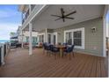 Relaxing deck with ocean views, outdoor seating and dining area at 6001 - 1081 S Kings Hwy., Myrtle Beach, SC 29575