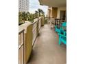 Spacious balcony with ocean view and seating at 9994 Beach Club Dr. # 103, Myrtle Beach, SC 29572