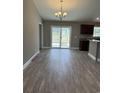 Spacious dining room with hardwood floors and sliding glass doors at Tbb13 Mineral Springs Rd., Conway, SC 29527