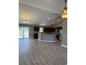 Open concept kitchen with granite counters and stainless steel appliances at Tbb13 Mineral Springs Rd., Conway, SC 29527