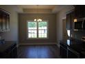 Eat-in kitchen with dark cabinets, granite countertops, and stainless steel appliances at Tbd 15 Mineral Springs Rd., Conway, SC 29527