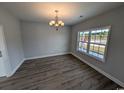 Elegant dining room with hardwood floors and a chandelier at Tbd 9 Casey Dr., Nichols, SC 29581