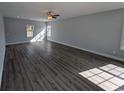 Bright living room with hardwood floors and large windows at Tbd 9 Casey Dr., Nichols, SC 29581