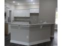 Modern kitchen with white shaker cabinets and granite countertops at Tbd14 Mineral Springs Rd., Conway, SC 29527