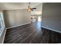 Bright living room featuring dark laminate floors and high ceilings at Tbd20 Casey Dr., Nichols, SC 29581
