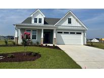 Charming two-story home with landscaping at 1228 Colusa Ct., Little River, SC 29566