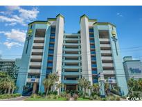 High rise building with parking garage, and ocean view at 6804 N Ocean Blvd. # 1233, Myrtle Beach, SC 29572