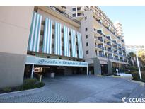 Exterior of Grand Shores Resort, featuring parking garage at 201 77Th Ave. N # 821, Myrtle Beach, SC 29572