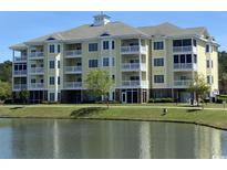 Three-story building with lakefront views at 4843 Luster Leaf Circle # 102, Myrtle Beach, SC 29577
