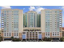Oceanfront high-rise building with multiple balconies and parking at 603 S Ocean Blvd. # 1011, North Myrtle Beach, SC 29582