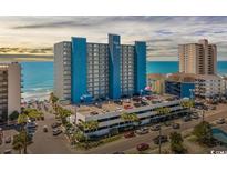 Oceanfront resort, parking and beach access visible at 1012 N Waccamaw Dr. # 103, Garden City Beach, SC 29576
