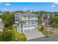Two-story house with a two-car garage and driveway at 1010 Perrin Dr., North Myrtle Beach, SC 29582