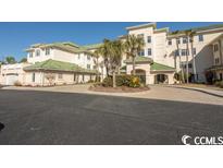 Luxury building with green roof and palm trees at 2180 Waterview Dr. # 133, North Myrtle Beach, SC 29582